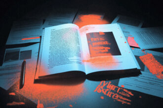 printed research paper with crossed out "first" claim surrounded by dated forum screenshots